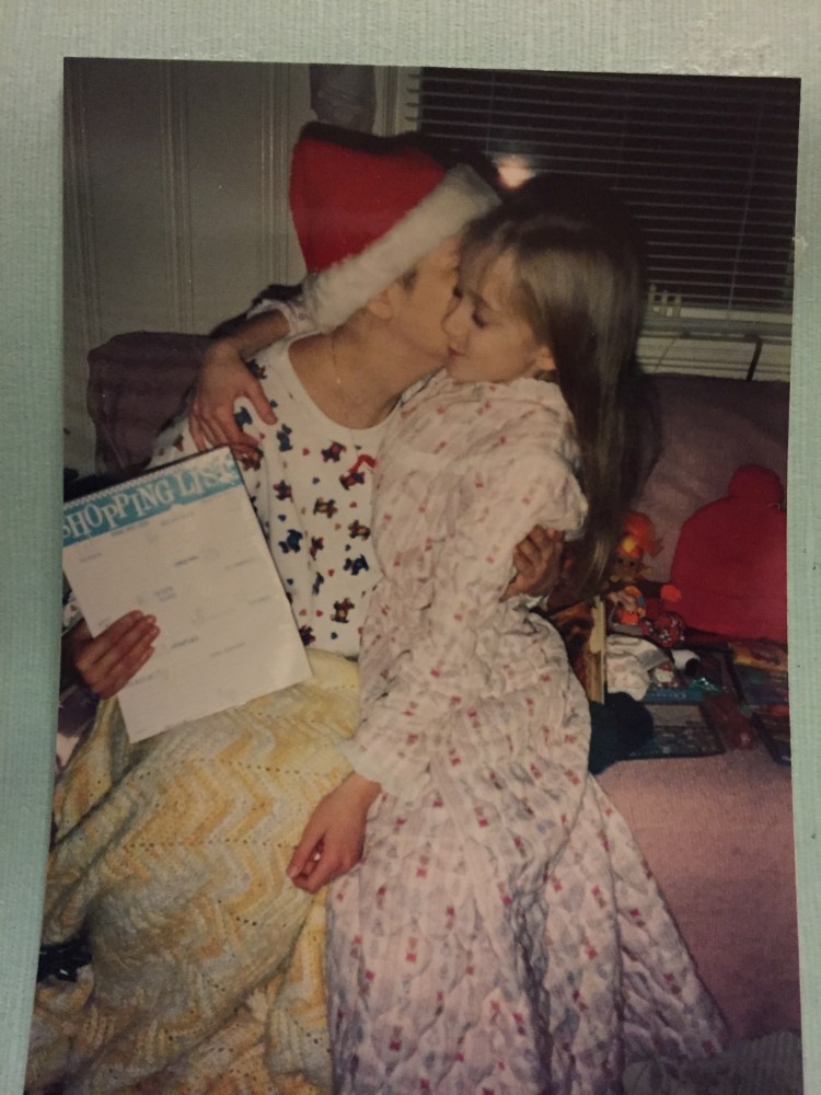 I love this photo, which I recently came across. This was my mom's last Christmas, two months before she died. I look so happy to be in her arms!